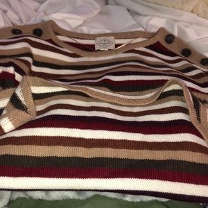 Almost new very cozy sweater. Has 3 stylish buttons on each shoulder.